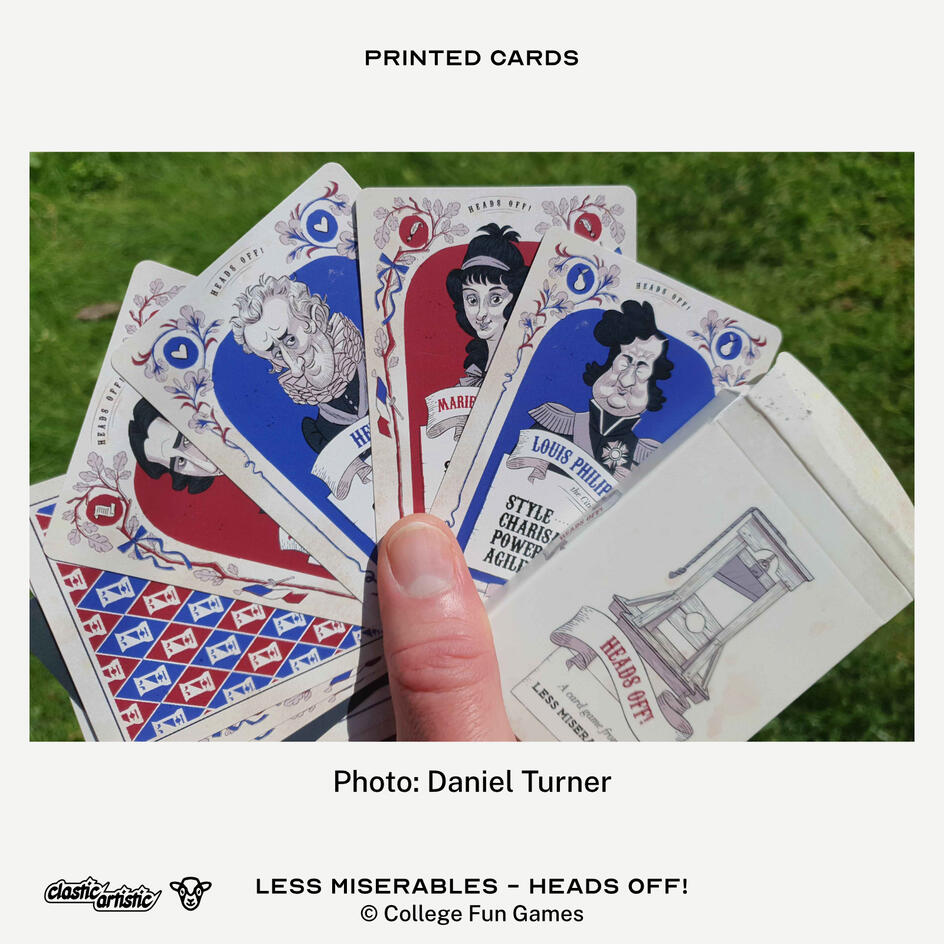 Image: A selection of cards from the Heads Off! game including the card back. Photo: Daniel Turner. Text: Less Miserables - Heads Off! ©College Fun Games